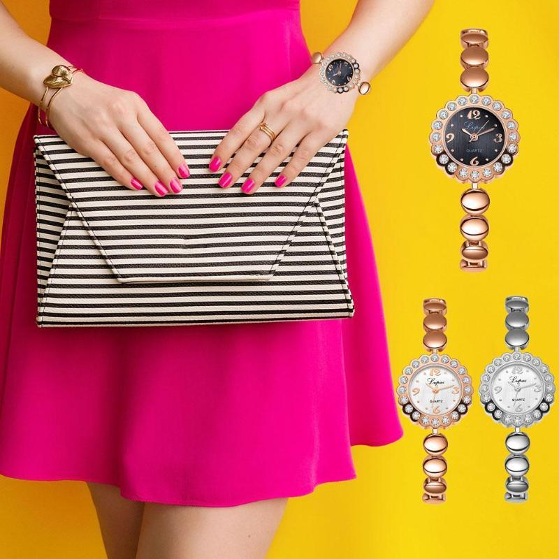 Wristwatches Fashion High Quality Brand Women's Watches Alloy Steel Strip Female Bracelet Watch Exquisite Small Dial Clock Quartz WristW, R g
Wristwatches Fashion High Quality Brand Women's Watches Alloy Steel Strip Female Bracelet Watch Exquisite Small Dial Clock Quartz WristW, R g