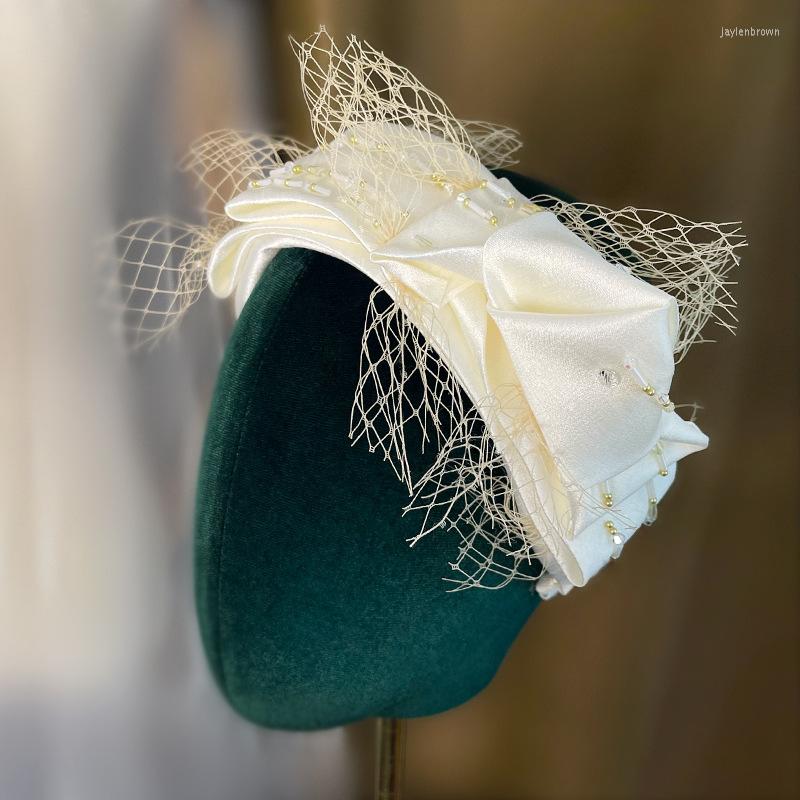 Headpieces French Hairband Mesh Veil Atmosphere Bridal Headdress Fairy Beauty Bow Crown Wedding Accessories.
Headpieces French Hairband Mesh Veil Atmosphere Bridal Headdress Fairy Beauty Bow Crown Wedding Accessories.