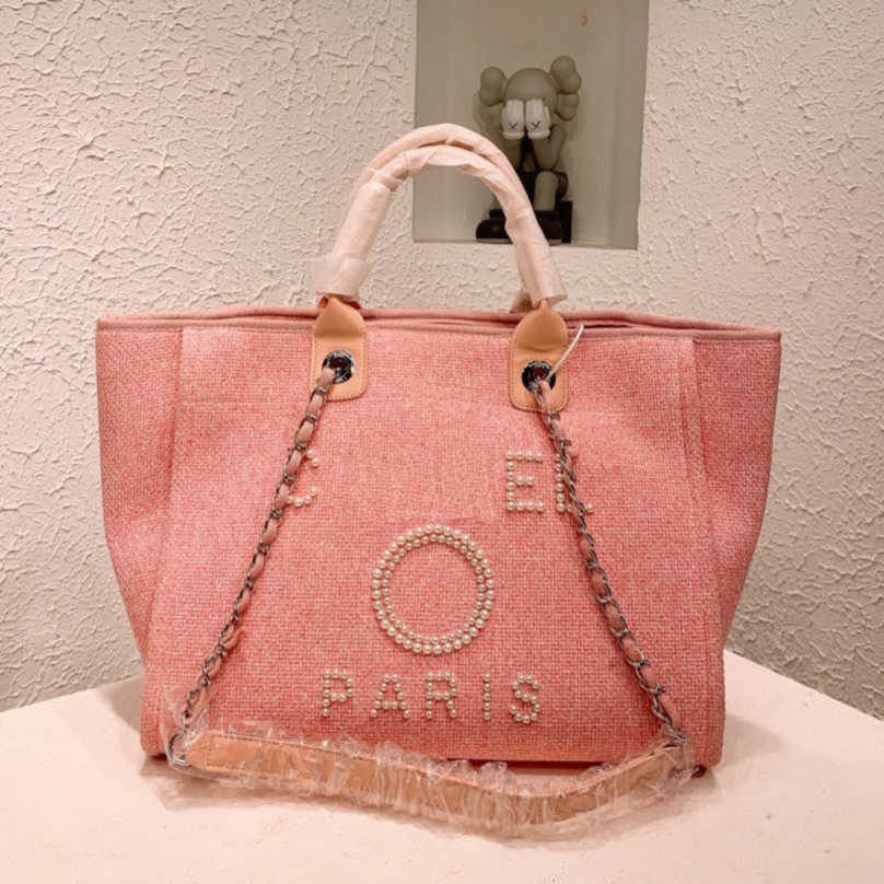 Women's Luxury Beach Bag Brand Hand Bags Embroidered Handbag Female Pearl Big Shopping Ladies Small Backpacks Designers Canvas Chain Backpack Evening Handbags HHML
Women's Luxury Beach Bag Brand Hand Bags Embroidered Handbag Female Pearl Big Shopping Ladies Small Backpacks Designers Canvas Chain Backpack Evening Handbags HHML