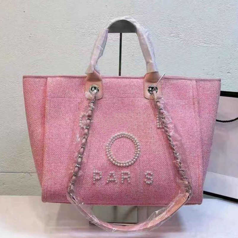 Women's Classics CH Luxury Hand Bags Embroidered Brand Handbag Female Pearl Beach Bag Big Shopping Small Backpacks Canvas Chain Backpack Evening Handbags Pp8b
Women's Classics CH Luxury Hand Bags Embroidered Brand Handbag Female Pearl Beach Bag Big Shopping Small Backpacks Canvas Chain Backpack Evening Handbags Pp8b