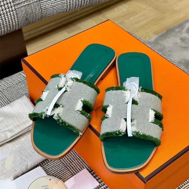Genuine Leather Oran H erms Flat Slippers Ladies Designer color canvas sandals and with leather temperament summerqqqqqq qq qq
Genuine Leather Oran H erms Flat Slippers Ladies Designer color canvas sandals and with leather temperament summerqqqqqq qq qq