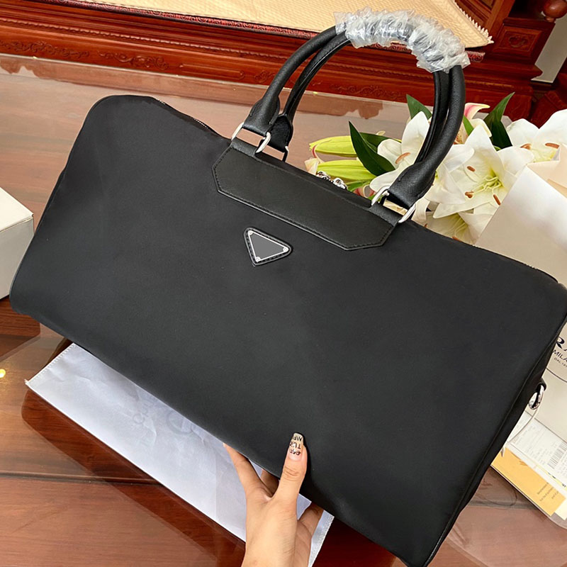 Bag 2023 Designer Big Traveling Bag Men's Huge Duffle Large Capacity Triangle Mark Nylon Available For Men And Women Fashion Trend New Launch 46x26cm, Prad 46x26
Bag 2023 Designer Big Traveling Bag Men's Huge Duffle Large Capacity Triangle Mark Nylon Available For Men And Women Fashion Trend New Launch 46x26cm, Prad 46x26