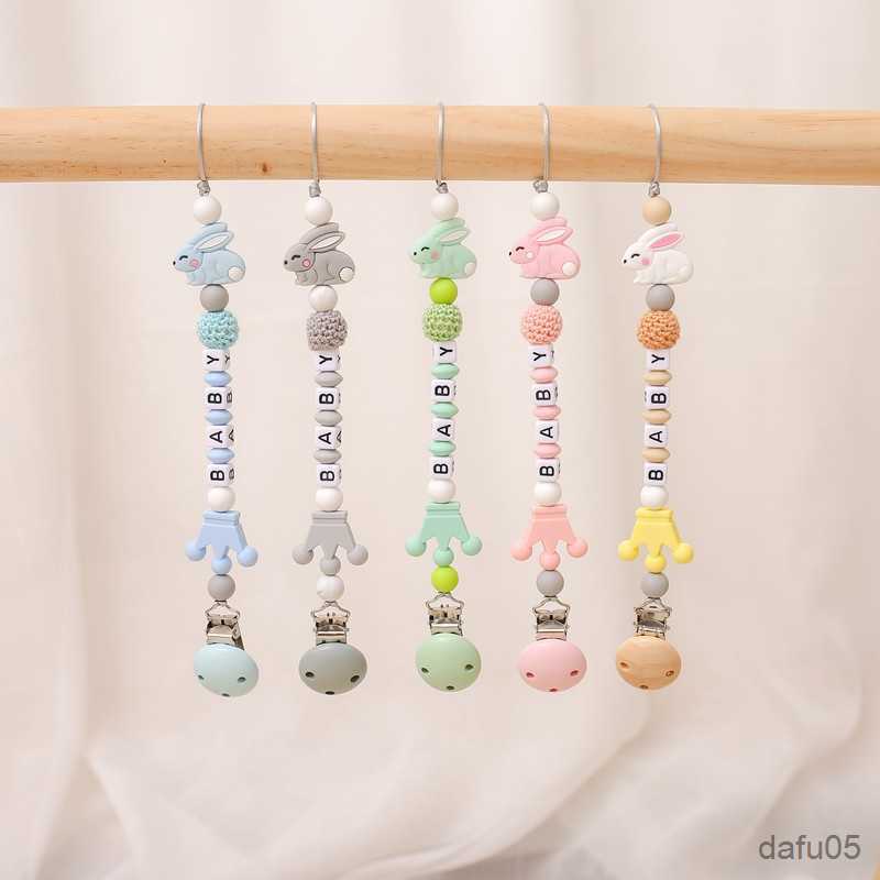 Pacifiers# 1pcs Silicone Personalised Name Baby Pacifier Clips Crochet Beads Silicone Crown Rabbit Pacifier Chain Holder Baby Gift
Pacifiers# 1pcs Silicone Personalised Name Baby Pacifier Clips Crochet Beads Silicone Crown Rabbit Pacifier Chain Holder Baby Gift