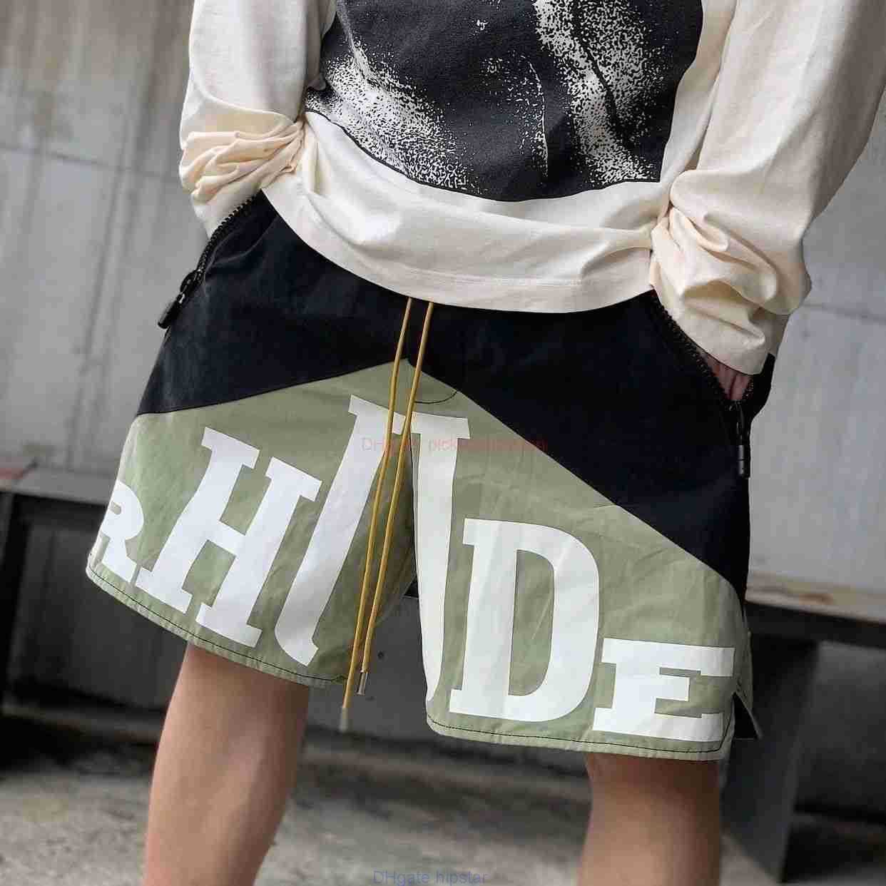 Designer Short Fashion Casual Clothing Beach shorts Rhude Fitness Shorts for Mens Summer New High Street Rgude Basketball Sports Casual Letter Breathable Trendy Br
Designer Short Fashion Casual Clothing Beach shorts Rhude Fitness Shorts for Mens Summer New High Street Rgude Basketball Sports Casual Letter Breathable Trendy Br