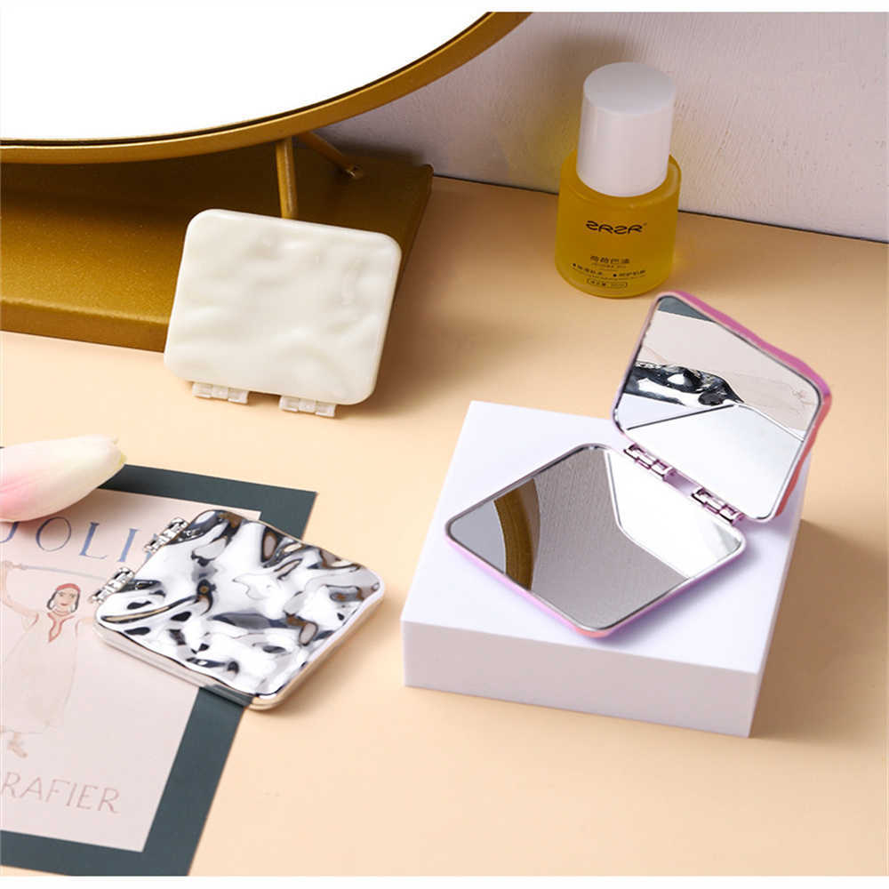 Makeup Tools Hand-fold Portable Pocket Mirror Can Stand Mini Colored Desktop Decorative Mirror Hand-held Folding Cosmetic Mirrors J230601
Makeup Tools Hand-fold Portable Pocket Mirror Can Stand Mini Colored Desktop Decorative Mirror Hand-held Folding Cosmetic Mirrors J230601