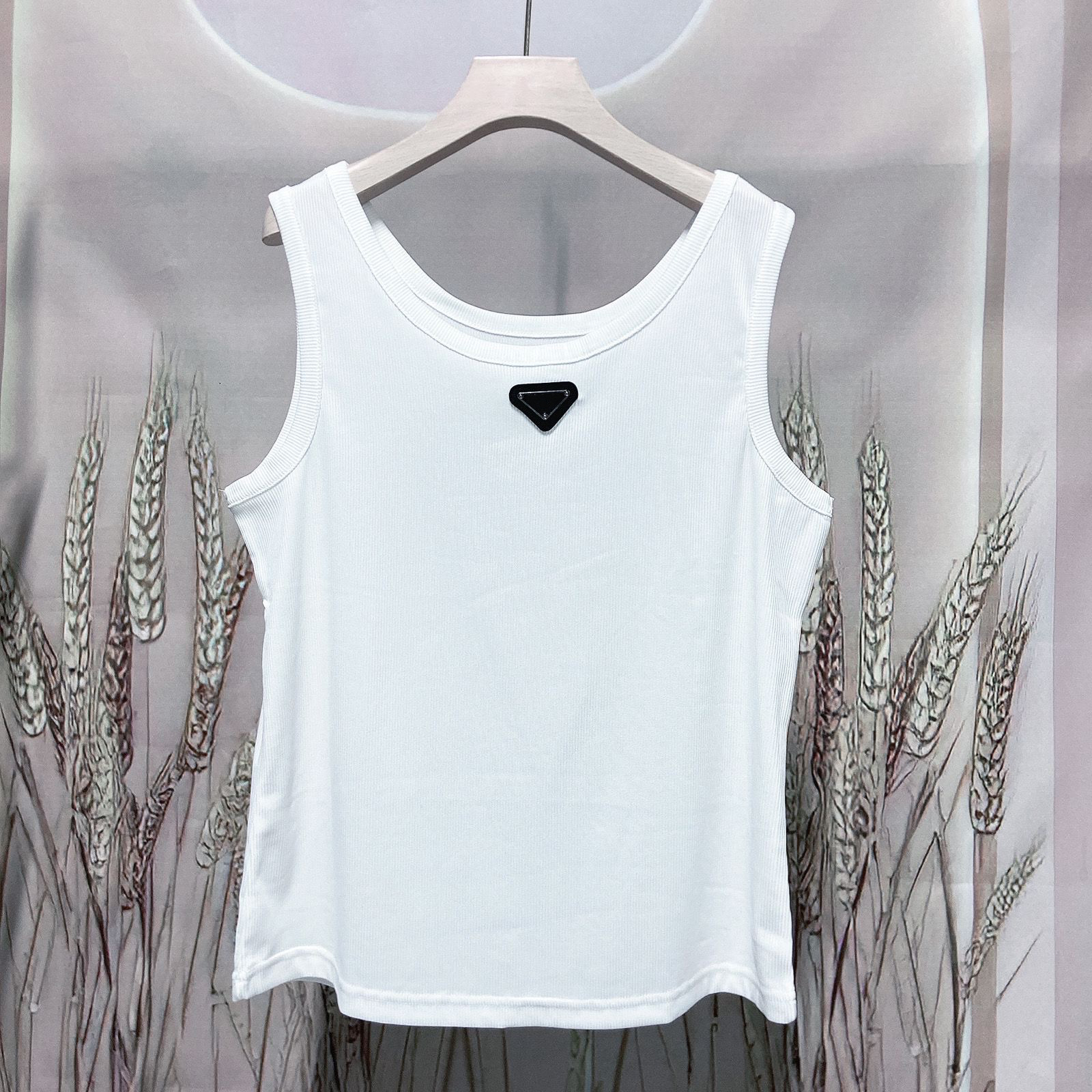 Summer designer Prrra White Women Prada Tops Tees Crop Top Sexy Off Shoulder Black Tank Top Casual Sleeveless Backless Top Shirts Luxury Designer Solid Color Vest
Summer designer Prrra White Women Prada Tops Tees Crop Top Sexy Off Shoulder Black Tank Top Casual Sleeveless Backless Top Shirts Luxury Designer Solid Color Vest