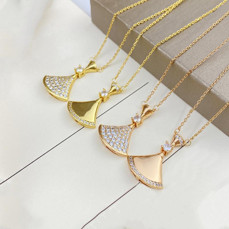 Womens jewelry shell pendant designer necklace gem pendants necklace diamond gold silver luxury high version full diamond fan necklace
Womens jewelry shell pendant designer necklace gem pendants necklace diamond gold silver luxury high version full diamond fan necklace