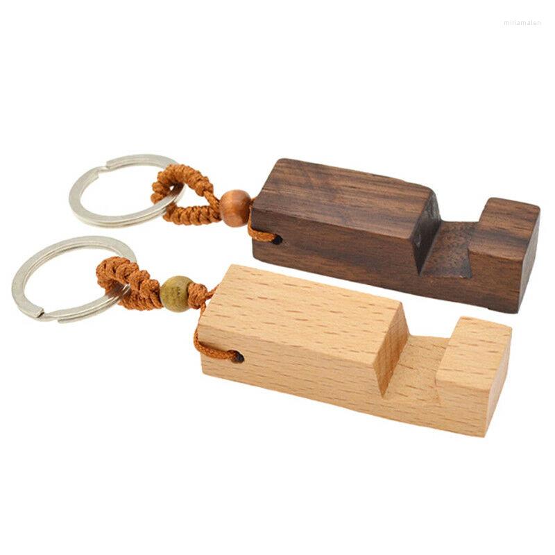 Keychains 1pc Creative Lightweight Slim Design Wooden Mobile Phone Stand Holder Pendant Keychain
Keychains 1pc Creative Lightweight Slim Design Wooden Mobile Phone Stand Holder Pendant Keychain