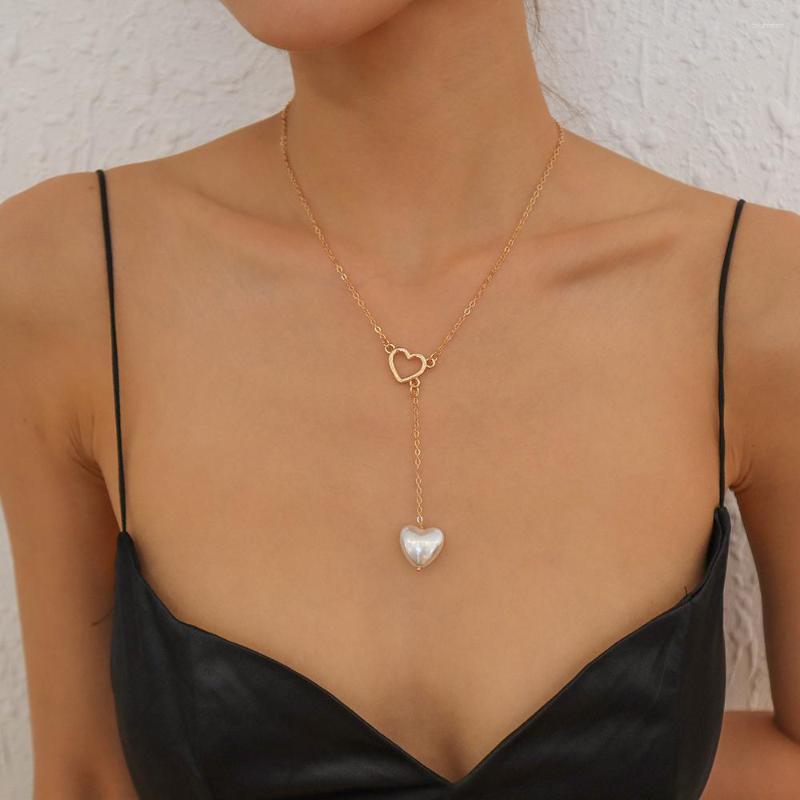Pendant Necklaces Vintage Simple Gold Color Long Chain Heart Shape Artificial Pearl Fringe Necklace For Women Fashion Girl Cute Jewelry
Pendant Necklaces Vintage Simple Gold Color Long Chain Heart Shape Artificial Pearl Fringe Necklace For Women Fashion Girl Cute Jewelry