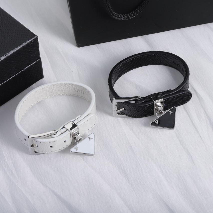 Luxury Fashion Leather Charm Bracelets Triangle Letter Watch Band for Men Women Jewelry Adjustable Size Personality Unisex Bracelet
Luxury Fashion Leather Charm Bracelets Triangle Letter Watch Band for Men Women Jewelry Adjustable Size Personality Unisex Bracelet
