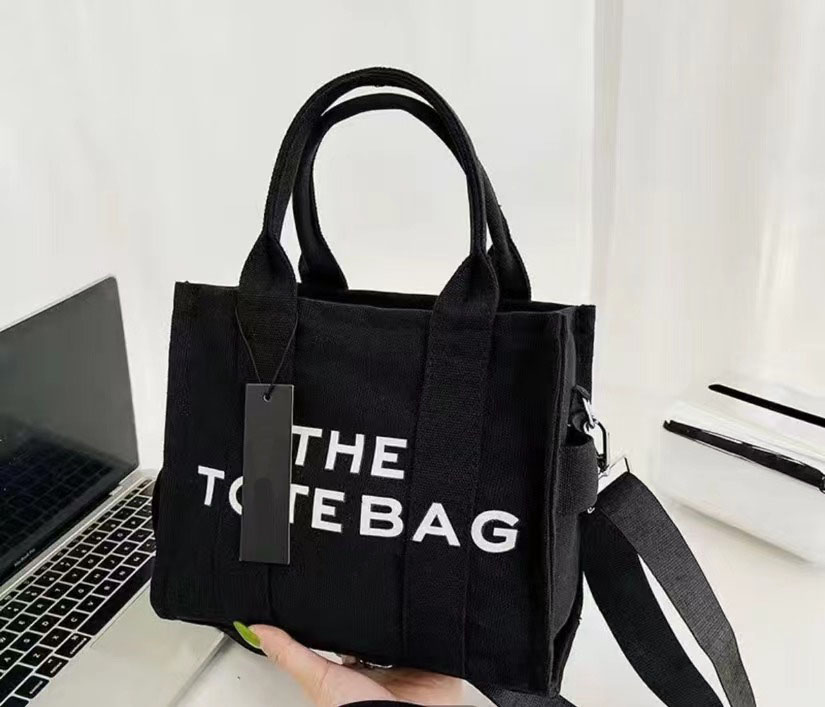 The tote bag Designer bags tote bag Single Totes Designer bag Women Casual Canvas Fashion Shoulder bag Crossbody bag Shopping Handbag LOGO 4 model 2size mini large1, #2
The tote bag Designer bags tote bag Single Totes Designer bag Women Casual Canvas Fashion Shoulder bag Crossbody bag Shopping Handbag LOGO 4 model 2size mini large1, #2