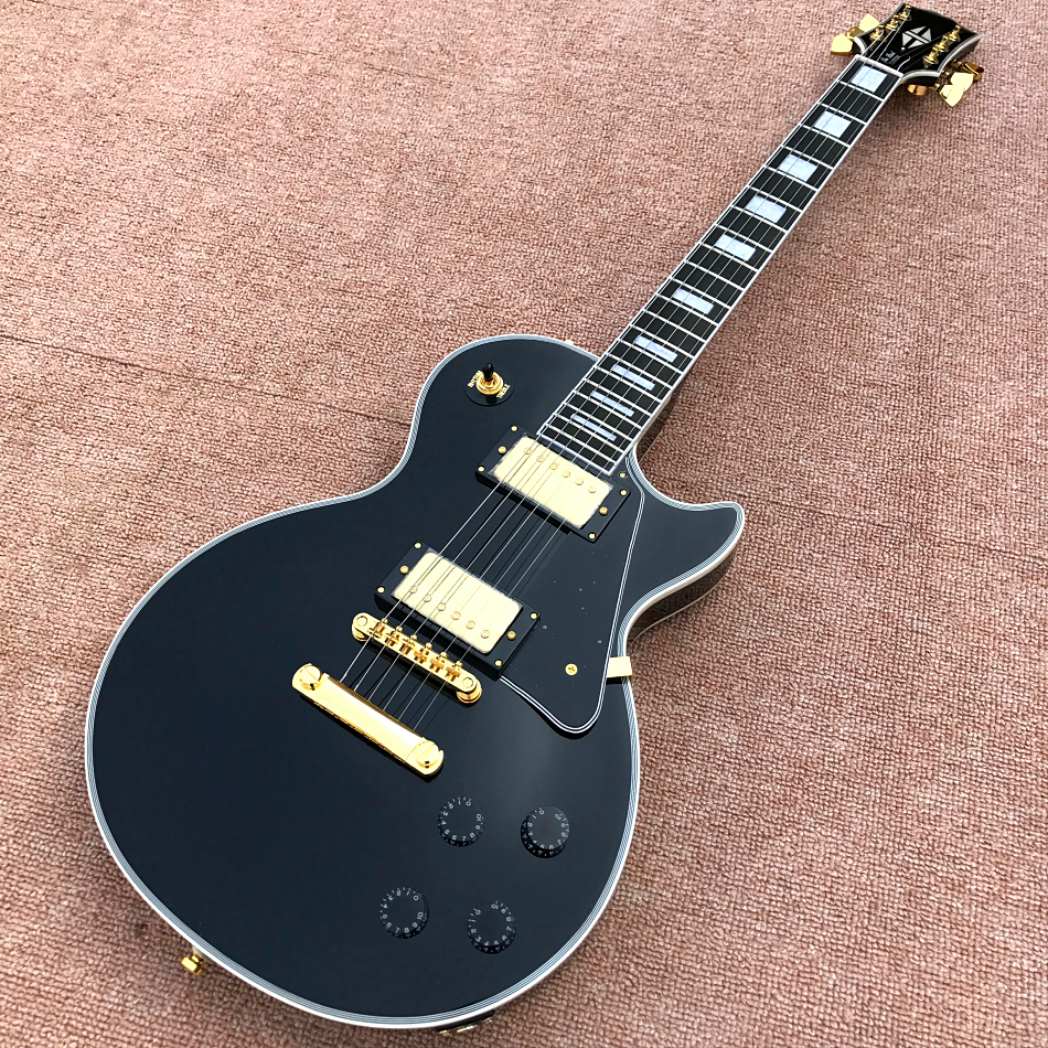 Custom Shop, black Lp Custom electric guitar, gold hardware, ebony bindings, free shipping
Custom Shop, black Lp Custom electric guitar, gold hardware, ebony bindings, free shipping