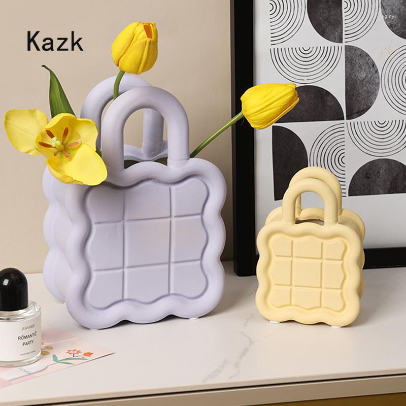Vases Nordic Creativity Handbag Ceramic Vase Ornament Fashion Art Home Desktop Flower Arrangement Ikebana Living Room Decoration
Vases Nordic Creativity Handbag Ceramic Vase Ornament Fashion Art Home Desktop Flower Arrangement Ikebana Living Room Decoration