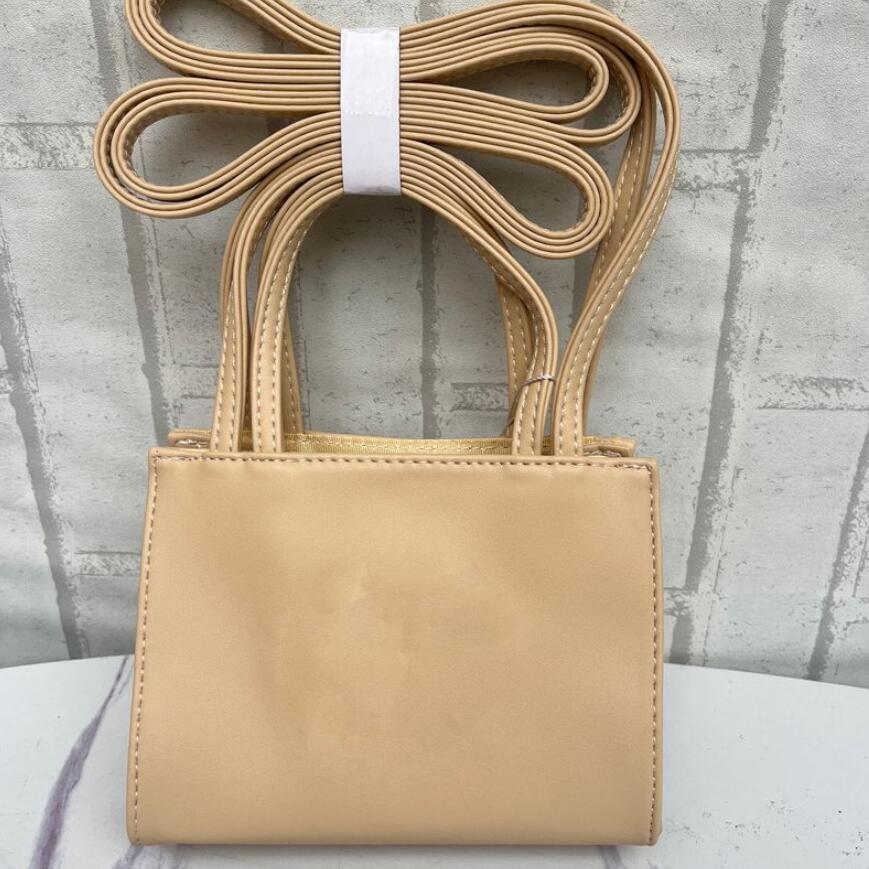 2023 designer Shoulder bags Telfars Handbags Mini Medium women telfer tote large big Leather Crossbody luxurious Fashion Shopping black gold Satchels bag
2023 designer Shoulder bags Telfars Handbags Mini Medium women telfer tote large big Leather Crossbody luxurious Fashion Shopping black gold Satchels bag