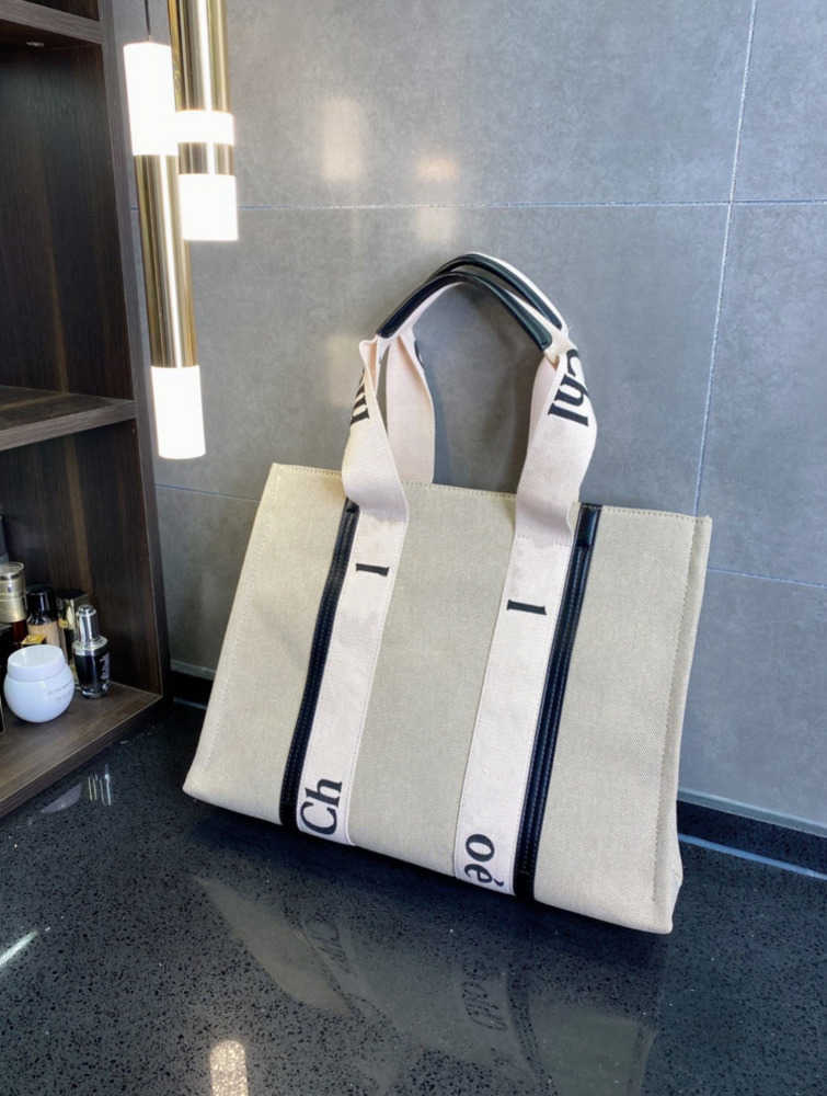 5A Top Women's Handbag WOODY Tote Shopping Bag Luxury Designer Handbag Classic Canvas Fashion Raffia Big Beach Bag Travel Slant Summer New style2023, Canvas + black leather
5A Top Women's Handbag WOODY Tote Shopping Bag Luxury Designer Handbag Classic Canvas Fashion Raffia Big Beach Bag Travel Slant Summer New style2023, Canvas + black leather