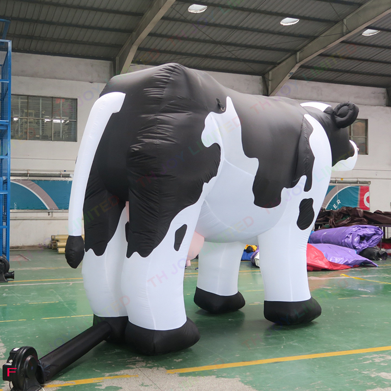 wholesale Outdoor Activities Customizable purple color twist neck cow giant inflatable animal milk cow cattle for farm advertising