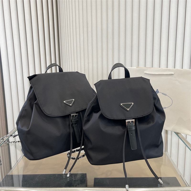 Fashion Backpacks Designers P Schoolbag With Nylon Vintage Shoulder Bags Woman Luggage Satchel Brand Travelling Purses High Quality, 32*30cm
Fashion Backpacks Designers P Schoolbag With Nylon Vintage Shoulder Bags Woman Luggage Satchel Brand Travelling Purses High Quality, 32*30cm