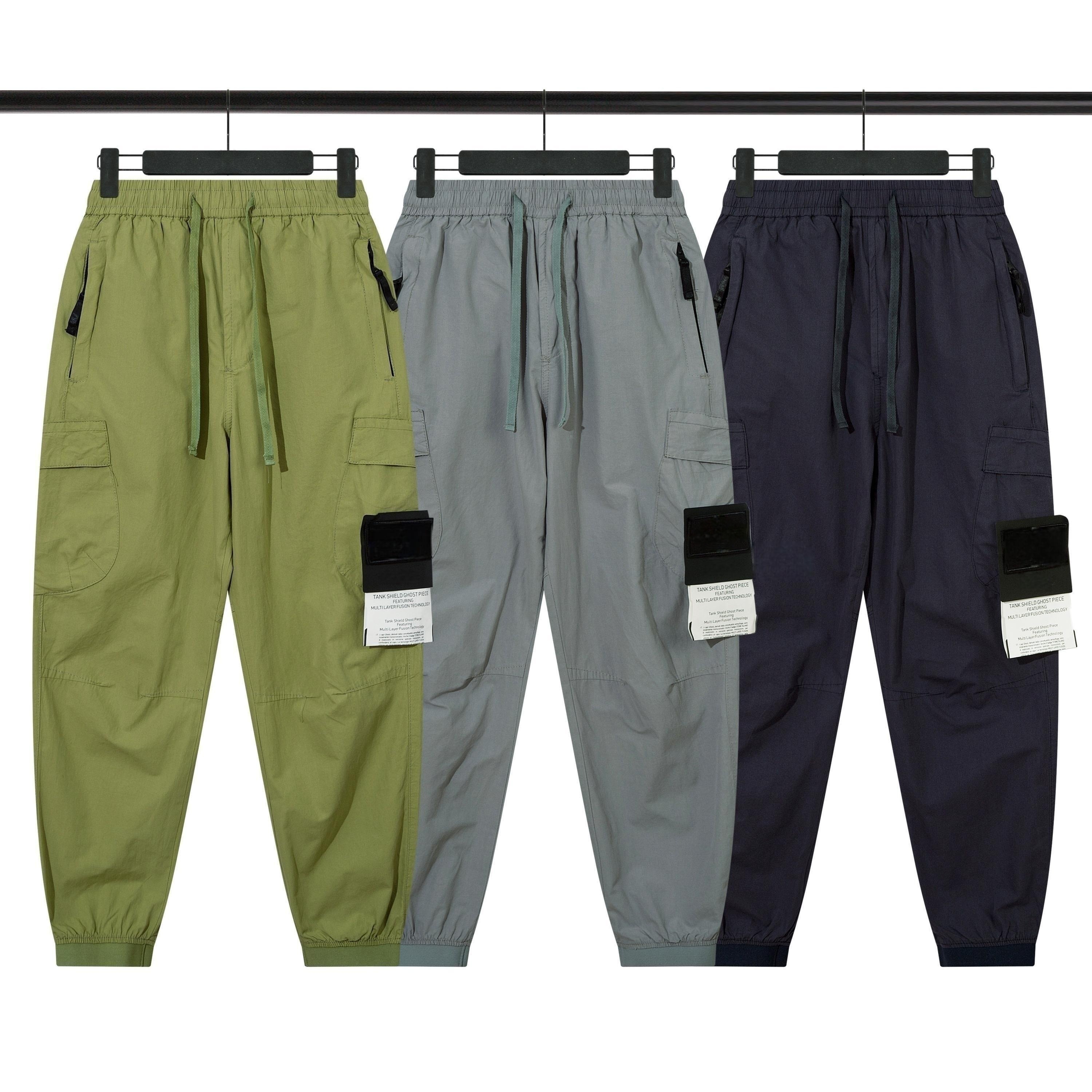23SS Spring Men Cotton Pants Basic Compass Badge Embroidered High Quality Tooling Pocket Trousers Sport Wear Casual 2705
23SS Spring Men Cotton Pants Basic Compass Badge Embroidered High Quality Tooling Pocket Trousers Sport Wear Casual 2705