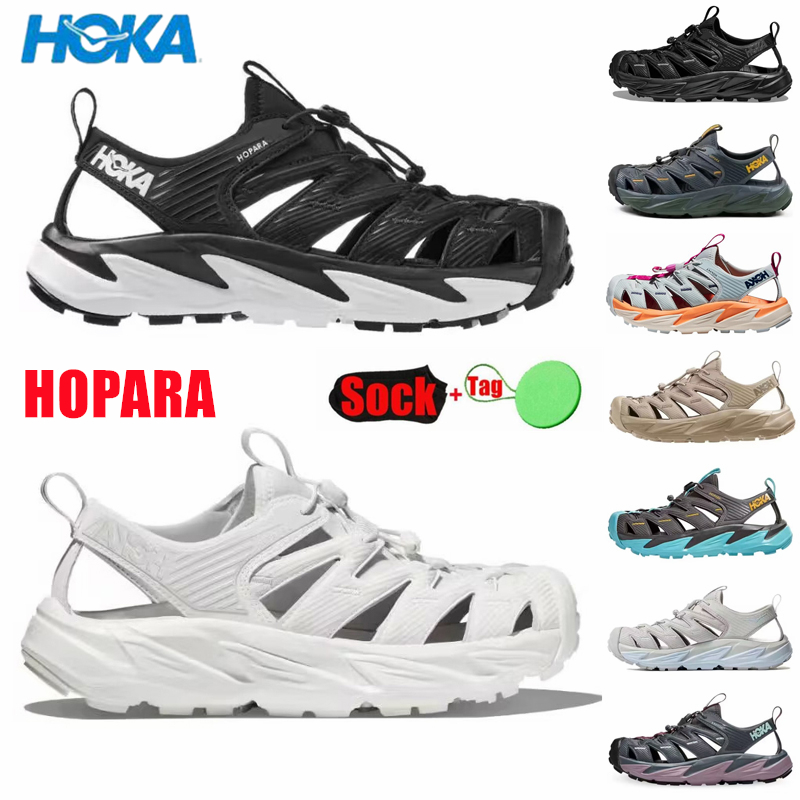 HOKA HOPARA Designer Sandals Men Women Hoka One One Shock Absorbing Walking Function Triple Black Sand Luxurys ORA Recovery Slide 3 Dad Slides Sliders
HOKA HOPARA Designer Sandals Men Women Hoka One One Shock Absorbing Walking Function Triple Black Sand Luxurys ORA Recovery Slide 3 Dad Slides Sliders