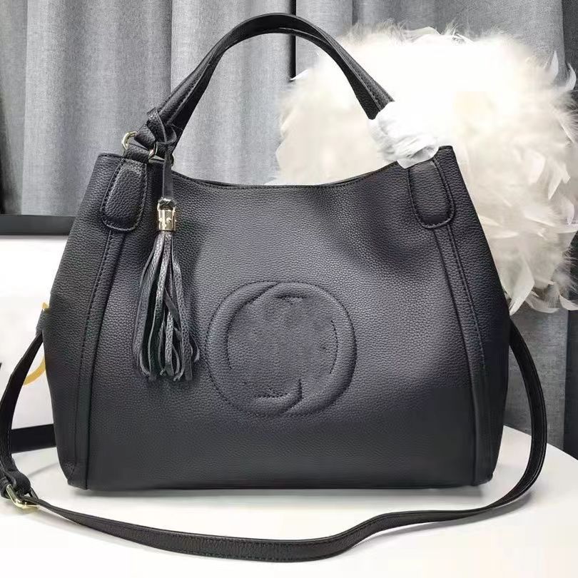 Advanced texture high-capacity oblique wing luxury handbags real leather senior designer of large-capacity garbage bags of woman