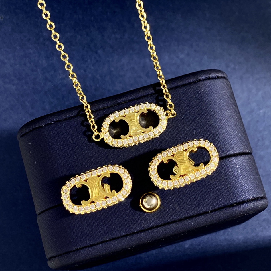 New designed TRIOMPHE pendant EARRINGS necklace IN BRASS WITH GOLD SHINY WOMEN EAR HOOPS Designer Jewelry ER90087 
New designed TRIOMPHE pendant EARRINGS necklace IN BRASS WITH GOLD SHINY WOMEN EAR HOOPS Designer Jewelry ER90087