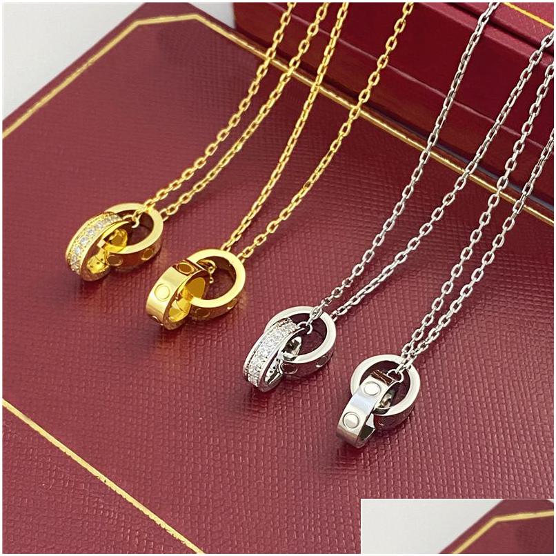 Pendant Necklaces Choker Womens Necklace For Woman Love Jewelry Gold Dual Ring Stainless Steel Jewlery Fashion Oval Interlocking Rin Dhkwh
Pendant Necklaces Choker Womens Necklace For Woman Love Jewelry Gold Dual Ring Stainless Steel Jewlery Fashion Oval Interlocking Rin Dhkwh