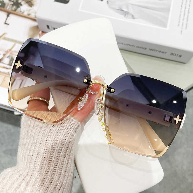 Sunglasses Sunglasses Frames New style slim face sunglasses four leaf UV resistant frameless cut edge sunglasses women's fashion glasses
Sunglasses Sunglasses Frames New style slim face sunglasses four leaf UV resistant frameless cut edge sunglasses women's fashion glasses