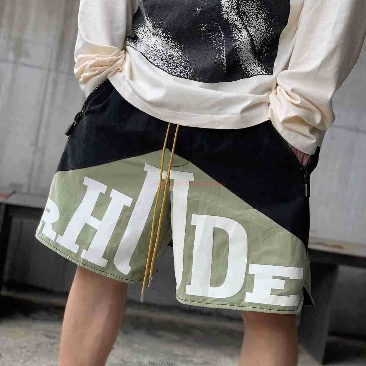 Designer Short Fashion Casual Clothing Beach shorts Rhude Fitness Shorts for Mens Summer New High Street Rgude Basketball Sports Casual Letter Breathable Trendy Br
Designer Short Fashion Casual Clothing Beach shorts Rhude Fitness Shorts for Mens Summer New High Street Rgude Basketball Sports Casual Letter Breathable Trendy Br