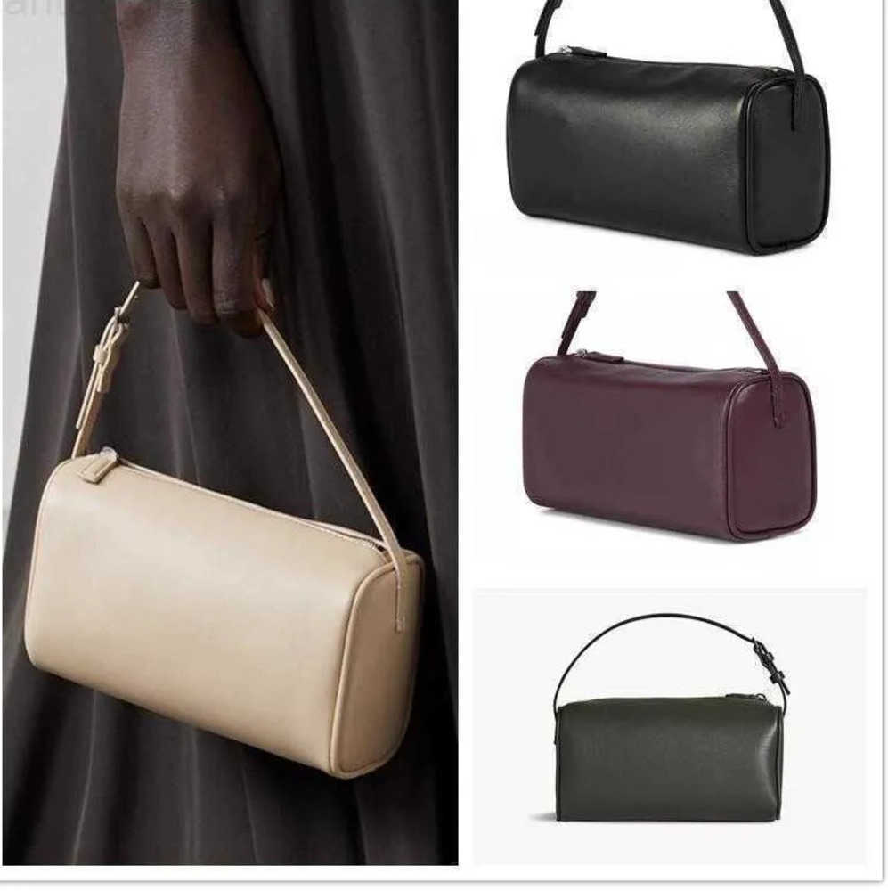 Designer Bags Leather The/Row Pencil Bag Simple Handbag 90s Cow Penholder Mini armpit Solid Fashion Classic Foreign style handbag2023, Black
Designer Bags Leather The/Row Pencil Bag Simple Handbag 90s Cow Penholder Mini armpit Solid Fashion Classic Foreign style handbag2023, Black