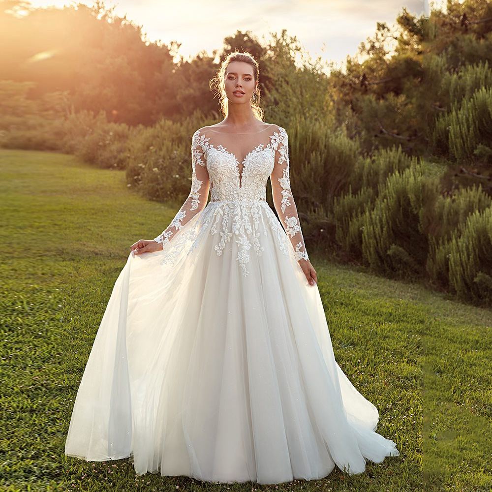 Modern Illusion Appliques A Line Wedding Dresses for Women Scoop Neck Long Sleeve Bohemian Bridal Gowns, Champagne
Modern Illusion Appliques A Line Wedding Dresses for Women Scoop Neck Long Sleeve Bohemian Bridal Gowns, Champagne