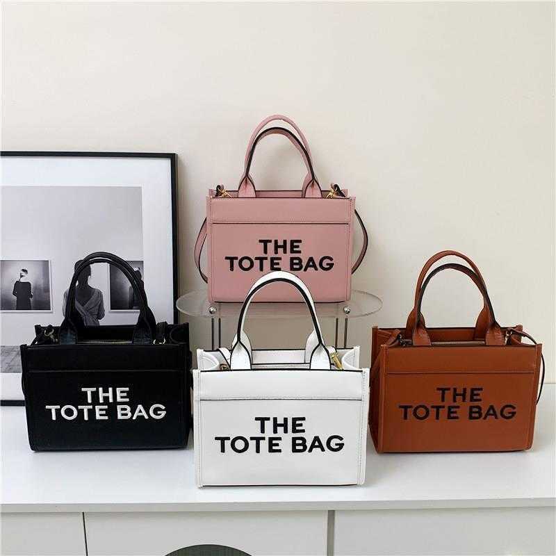 NEW Evening Bags letter Woven totes women Marc tote bag Summer straw designer bag Fashion Luxurys handbags all-match Shoulder bag purse, Mcj03 27x20x10cm
NEW Evening Bags letter Woven totes women Marc tote bag Summer straw designer bag Fashion Luxurys handbags all-match Shoulder bag purse, Mcj03 27x20x10cm