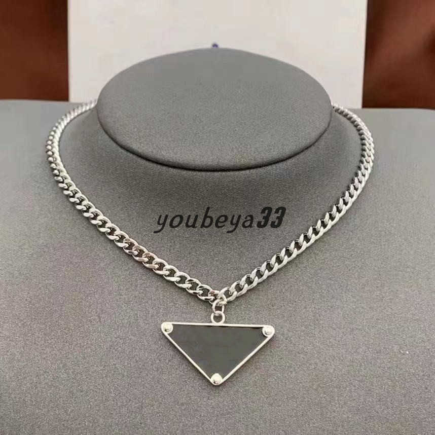 Classics Designer Necklace Women Men Chains Luxury Jewelry Black White P Triangle Pendant Party Hip Hop Punk Names Statement Gold Mens Necklaces Designer Jewelry
Classics Designer Necklace Women Men Chains Luxury Jewelry Black White P Triangle Pendant Party Hip Hop Punk Names Statement Gold Mens Necklaces Designer Jewelry