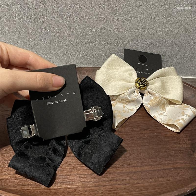 Hair Clips Korean Version Of The Vintage Elegant Printed Camellia Bow Spring Clip Simple Back Head Disc Hairpin Accessories Woman
Hair Clips Korean Version Of The Vintage Elegant Printed Camellia Bow Spring Clip Simple Back Head Disc Hairpin Accessories Woman