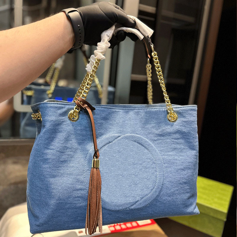 Chain Tote Bag Women Handbag Fashion Denim Travel Shopping Shoulder Bags Leather Tassel Decoration Interior Zipper Pocket Big Letters Lady Totes Purse, Blue
Chain Tote Bag Women Handbag Fashion Denim Travel Shopping Shoulder Bags Leather Tassel Decoration Interior Zipper Pocket Big Letters Lady Totes Purse, Blue