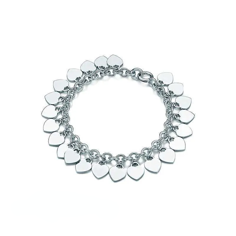 Charm Bracelets Famous 925 Sterling silver designer brands Classic Charm DIY Bracelet Multi Heart Label Handwear L221216
Charm Bracelets Famous 925 Sterling silver designer brands Classic Charm DIY Bracelet Multi Heart Label Handwear L221216