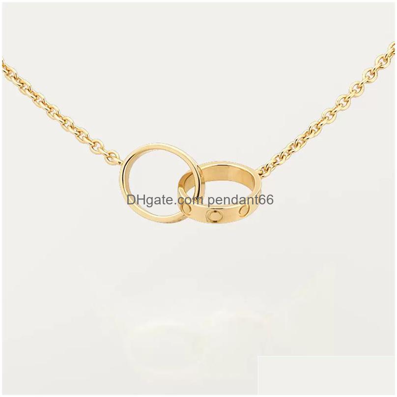 Pendant Necklaces Designer Heart Necklace Mens Gold Chain Womens Jewelry Plated Sier Titanium Steel Double Rings Love Name Woman Wed Dhfz5
Pendant Necklaces Designer Heart Necklace Mens Gold Chain Womens Jewelry Plated Sier Titanium Steel Double Rings Love Name Woman Wed Dhfz5