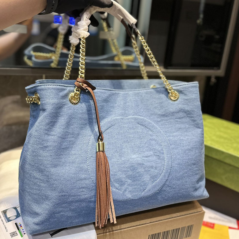 Denim Tote Bag Canvas Handbag Chain Shoulder Bags Tassel Pendant Classic Letter Large Capacity Shopping Bags Purse Inside Zipper Pocket Open Handbags
Denim Tote Bag Canvas Handbag Chain Shoulder Bags Tassel Pendant Classic Letter Large Capacity Shopping Bags Purse Inside Zipper Pocket Open Handbags