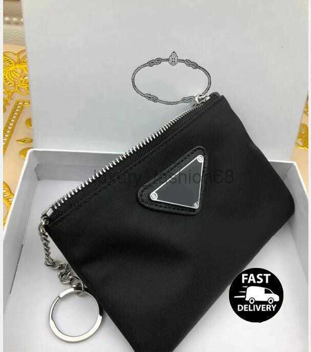 Luxury Designer key chain Nylon Canvas pouch Men Women Mini Wallets Keychains Black Zip pocket purse Lover Keychains Card holders Keyring Fashion Accessories 
Luxury Designer key chain Nylon Canvas pouch Men Women Mini Wallets Keychains Black Zip pocket purse Lover Keychains Card holders Keyring Fashion Accessories