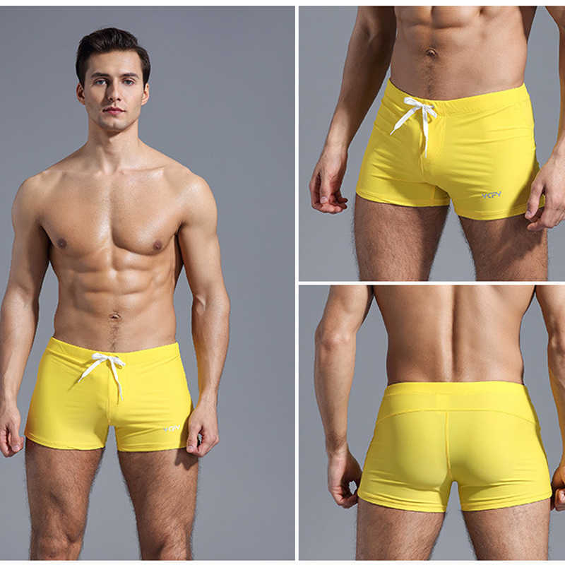 Men's Swimwear soild color man board surfing swimming trunks swimsuits men swimwear beachwear sexy pool swim briefs shorts bikini bathing suitsHKD230621
Men's Swimwear soild color man board surfing swimming trunks swimsuits men swimwear beachwear sexy pool swim briefs shorts bikini bathing suitsHKD230621