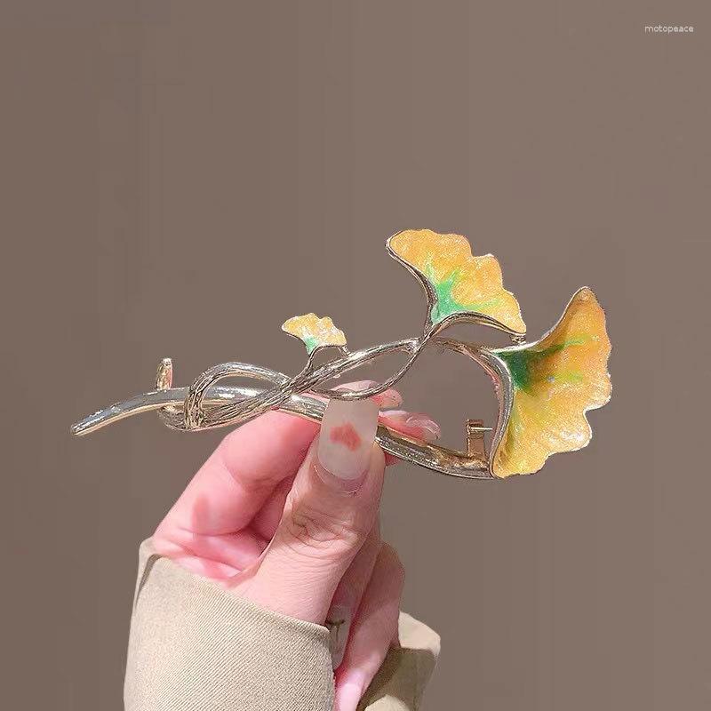Hair Clips Korean Golden Ginkgo Leaf Twisting Buckle Oil Dripping Metal Clip Elegant Female Fashion Accessories
Hair Clips Korean Golden Ginkgo Leaf Twisting Buckle Oil Dripping Metal Clip Elegant Female Fashion Accessories