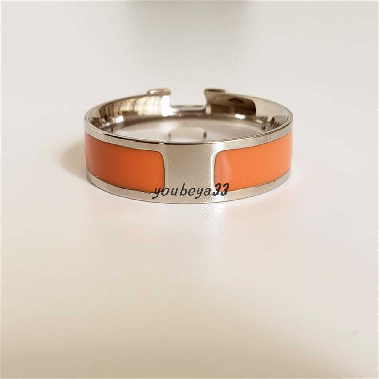 

Designer titanium steel 18K rose gold letter ring with female enamel index finger joint ring for couples