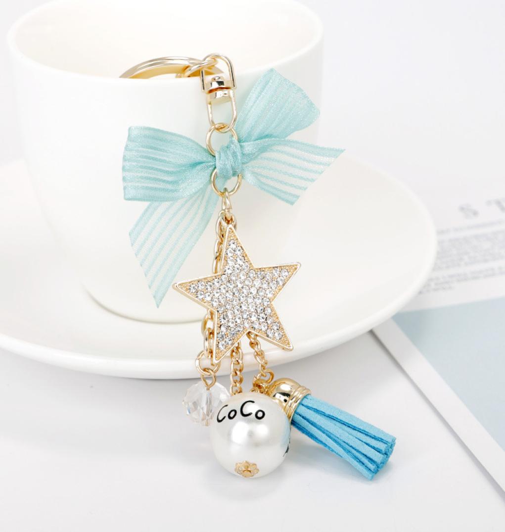 COCO Bag Charms Keyrings Keychains Artificial Pearl Star Bow Tassel Pendant Car Key Chains Holder for Girls Women Fashion Jewelry 5326144
COCO Bag Charms Keyrings Keychains Artificial Pearl Star Bow Tassel Pendant Car Key Chains Holder for Girls Women Fashion Jewelry 5326144
