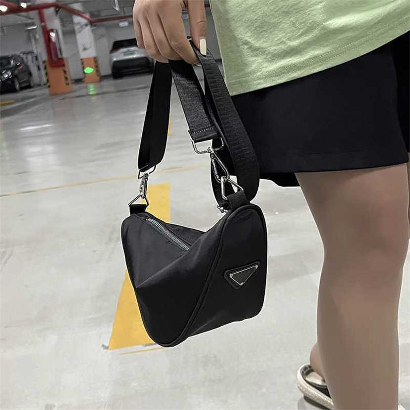 Designer bag 2023 hand Breast women's new personalized casual dumpling Korean version simple outdoor sports crossbody versatile triangle, White7
Designer bag 2023 hand Breast women's new personalized casual dumpling Korean version simple outdoor sports crossbody versatile triangle, White7
