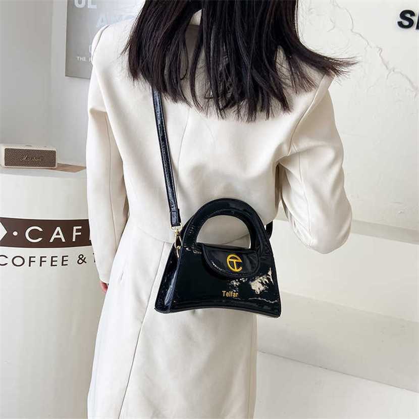 Designer bag 2023 handbag New Single Shoulder Handheld Crossbody Women's Factory Goods Trend Large Capacity Small Square Lacquer Leather Shiny Surface, White12
Designer bag 2023 handbag New Single Shoulder Handheld Crossbody Women's Factory Goods Trend Large Capacity Small Square Lacquer Leather Shiny Surface, White12