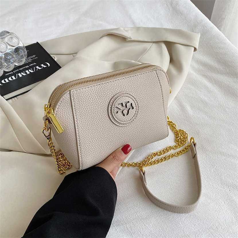 Designer bag 2023 handbag High Quality for Women New Korean Edition Simple Chain Portable One Shoulder Mesh Red Tide Crossbody, White11
Designer bag 2023 handbag High Quality for Women New Korean Edition Simple Chain Portable One Shoulder Mesh Red Tide Crossbody, White11