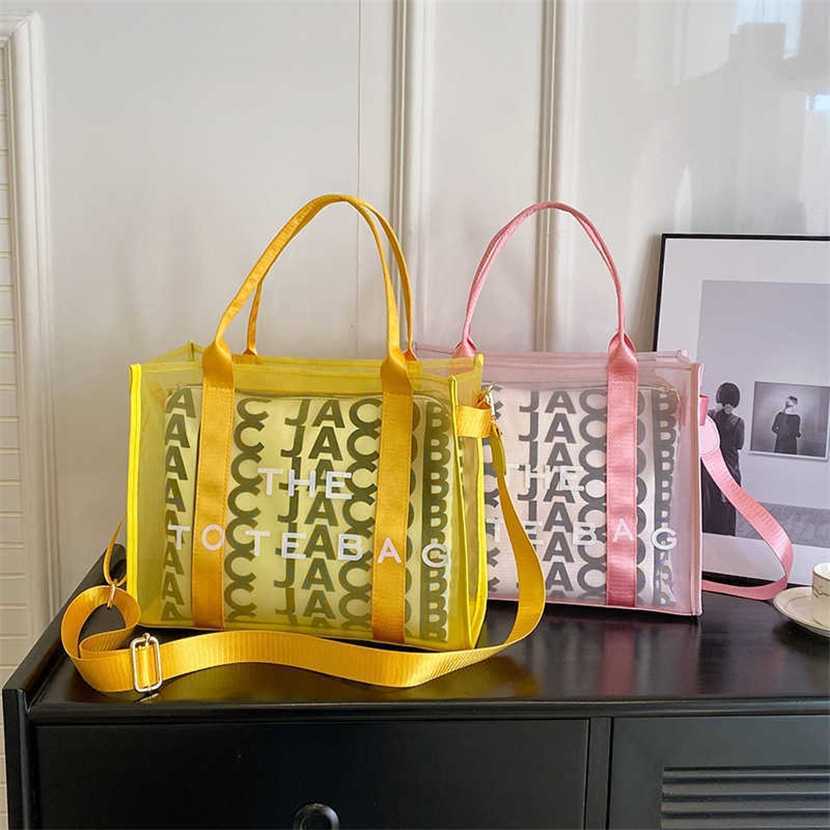 Designer bag 2023 handbag Women's Summer New Letter Printing Mesh Handheld One Shoulder Crossbody Foreign Style Tote, White12
Designer bag 2023 handbag Women's Summer New Letter Printing Mesh Handheld One Shoulder Crossbody Foreign Style Tote, White12