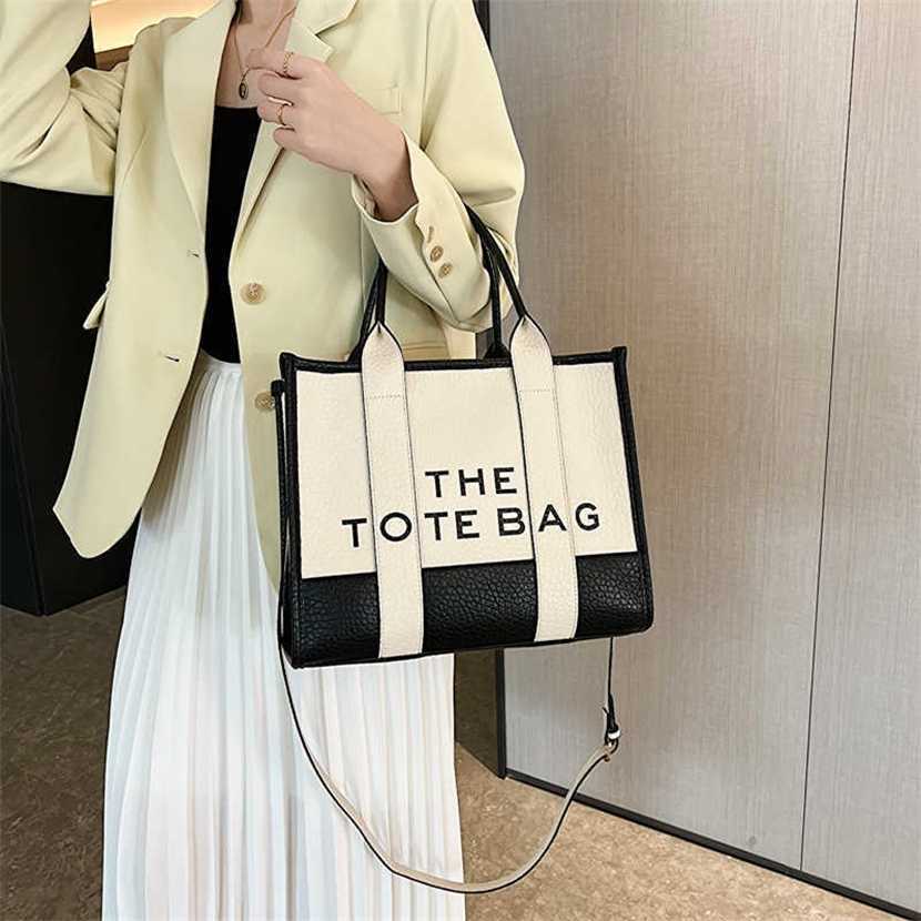 Designer bag 2023 handbag Large Capacity Women's New Simple Handbag One Shoulder Oblique Cross Tote Bags, Large size
Designer bag 2023 handbag Large Capacity Women's New Simple Handbag One Shoulder Oblique Cross Tote Bags, Large size