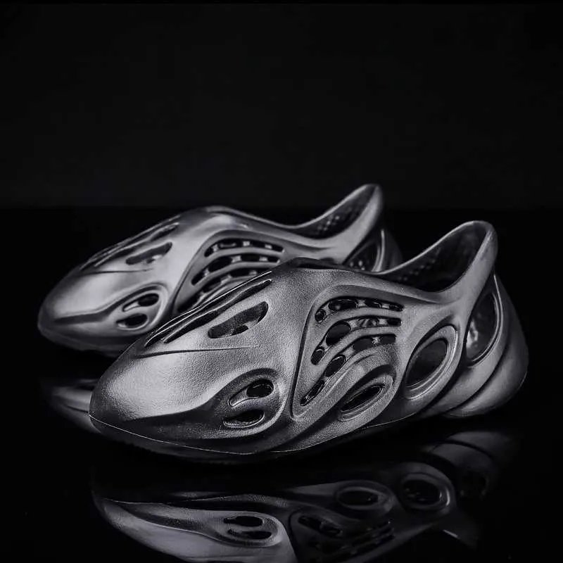 Slippers Putian coconut hole shoes summer new eva sandals men and women wear breathable fashion light beach shoes T230211, Black
Slippers Putian coconut hole shoes summer new eva sandals men and women wear breathable fashion light beach shoes T230211, Black