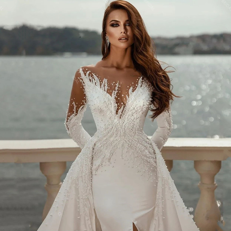 Luxury Mermaid Wedding Dresses Front Slit Pearls Beaded Satin Long Sleeves Bridal Gowns With Detachable Train Sheer Neck Modern Arabic Dubai Vestido D