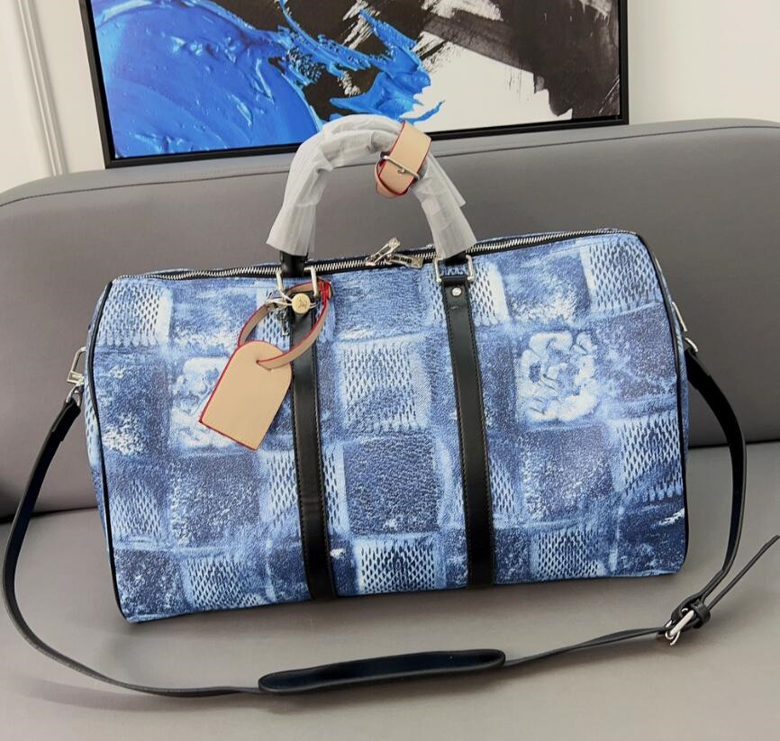 Classic Mens Keepall Travel Bag Blue Graffiti Grid Painting Letter Unisex Travel Bag Couples Airport Luggage Bag Leather Duffel Bags Women Fitness Yoga Bag Totes
Classic Mens Keepall Travel Bag Blue Graffiti Grid Painting Letter Unisex Travel Bag Couples Airport Luggage Bag Leather Duffel Bags Women Fitness Yoga Bag Totes